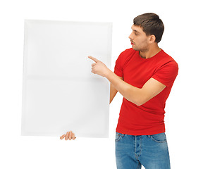 Image showing handsome man with big blank board