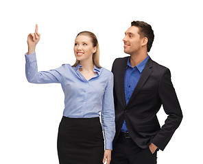 Image showing man and woman pointing their fingers