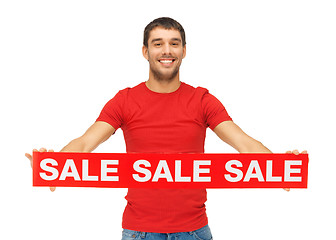 Image showing handsome man with sale sign