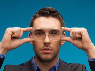 Image showing businessman in protective glasses