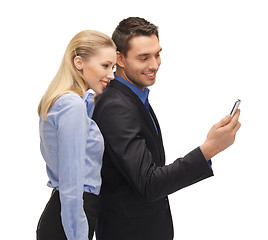 Image showing man and woman reading sms