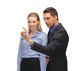 Image showing man and woman working with something imaginary