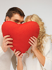 Image showing family couple in a sweaters with heart