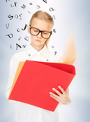 Image showing elementary school student with folders