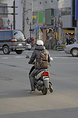 Image showing Man with scooter