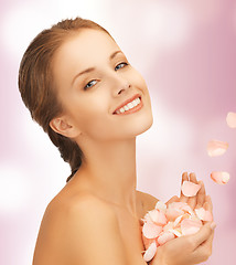Image showing beautiful woman with rose petals