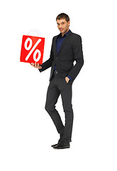 Image showing handsome man in suit with percent sign