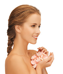 Image showing beautiful woman with rose petals