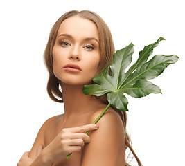 Image showing woman with green leaf