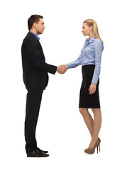 Image showing man and woman shaking their hands