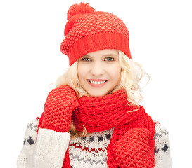 Image showing beautiful woman in hat, muffler and mittens