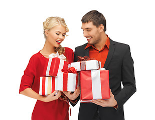 Image showing man and woman with gift boxes