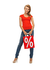 Image showing teenage girl in red t-shirt with shopping bag