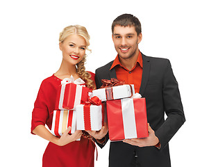 Image showing man and woman with gift boxes