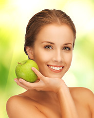 Image showing young beautiful woman with green apple