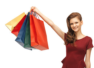 Image showing happy teenage girl with shopping bags