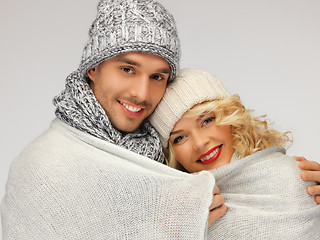 Image showing family couple under warm blanket