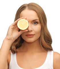 Image showing woman with lemon slice