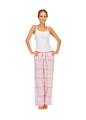 Image showing happy and smiling woman in cotton pajamas