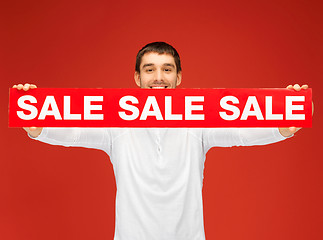 Image showing handsome man with sale sign