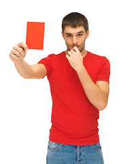 Image showing handsome man with red card