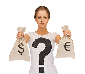 Image showing woman with dollar and euro signed bags