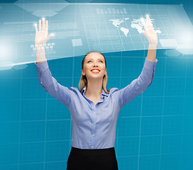 Image showing woman working with virtual screens