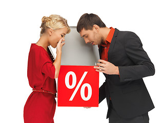 Image showing man and woman with percent sign