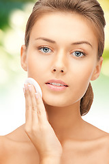 Image showing beautiful woman with cotton pad