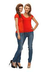 Image showing two beautiful teenage girls in red t-shirts