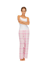 Image showing happy and smiling woman in cotton pajamas