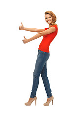 Image showing teenage girl in red t-shirt showing thumbs up