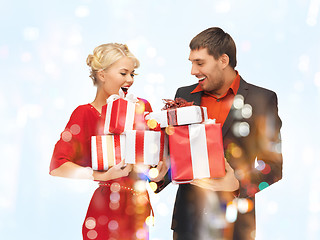 Image showing man and woman with gift boxes