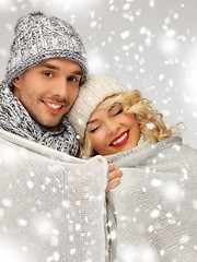 Image showing family couple under warm blanket