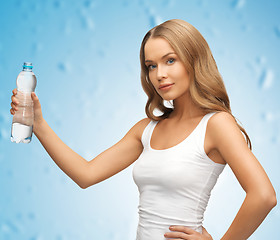 Image showing young beautiful woman with  bottle of water