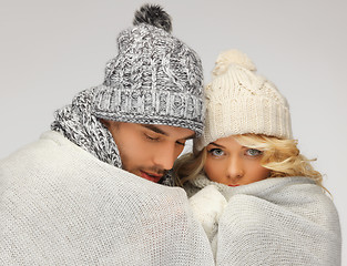 Image showing family couple under warm blanket