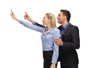 Image showing man and woman working with something imaginary