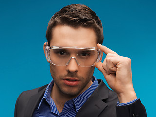 Image showing businessman in protective glasses