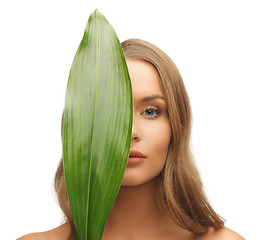 Image showing woman with green leaf