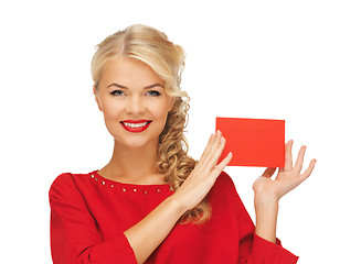 Image showing lovely woman in red dress with note card