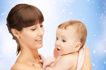 Image showing happy mother with adorable baby