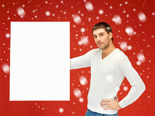 Image showing handsome man with big blank board