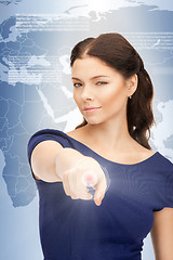 Image showing businesswoman working with touch screen