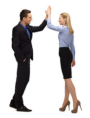 Image showing man and woman giving a high five