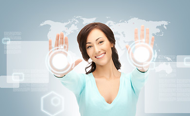 Image showing businesswoman working with touch screen