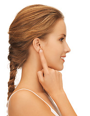 Image showing woman pointing to ear