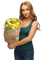 Image showing woman with shopping bag full of fruits