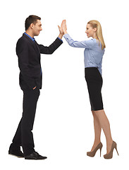 Image showing man and woman giving a high five