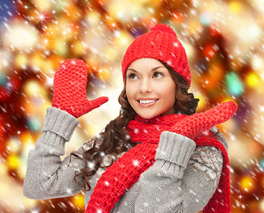 Image showing beautiful woman in hat, muffler and mittens