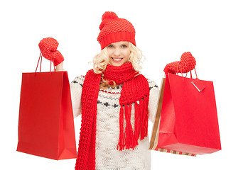 Image showing young girl with shopping bags